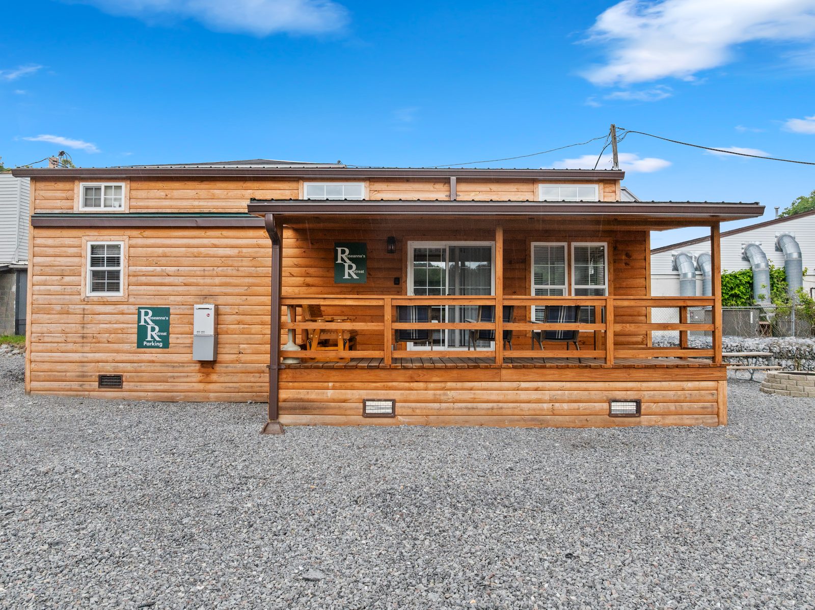 Roseanne's Retreat park model cabin exterior with covered porch at Buffalo Trail Resort