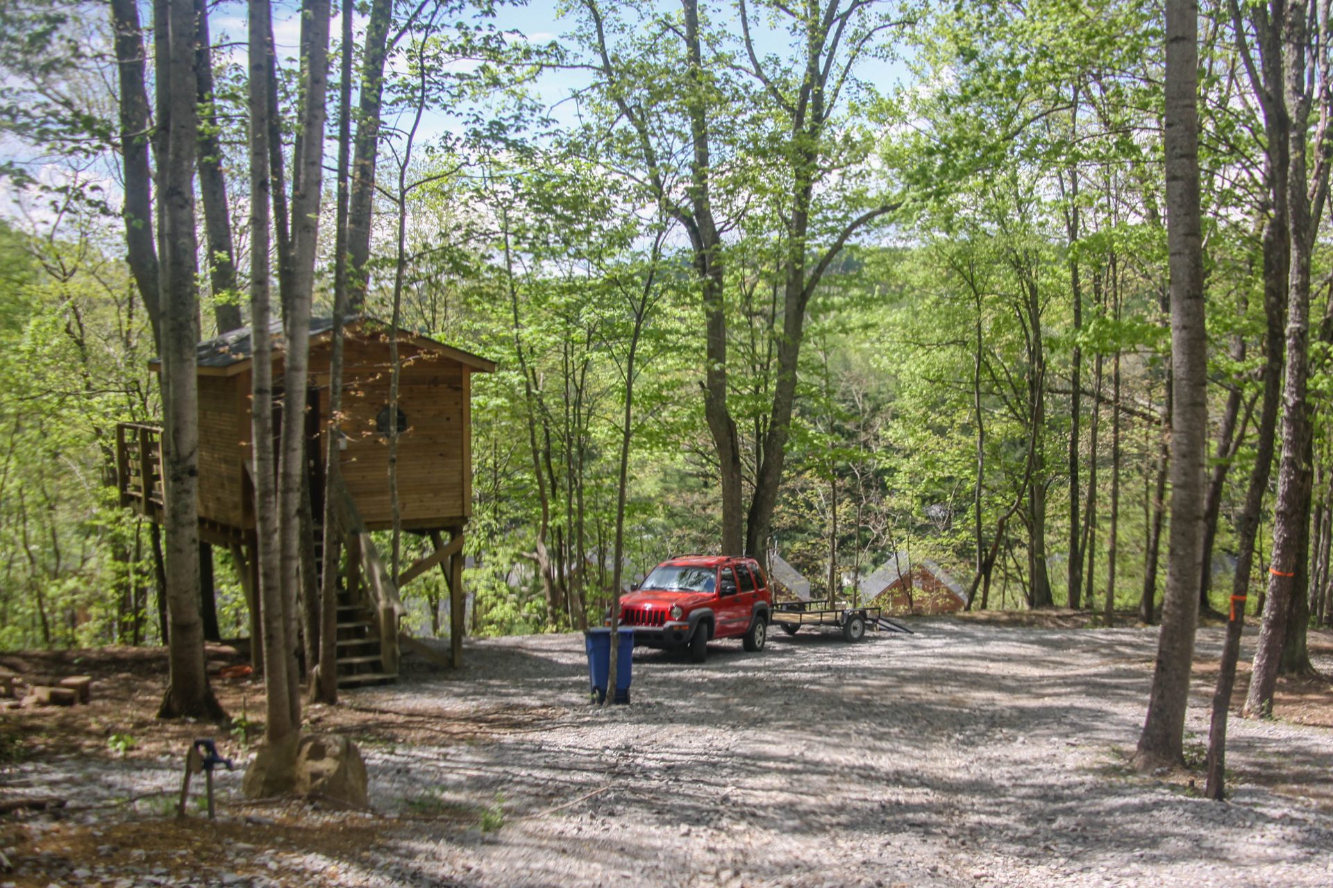 Rustic Treehouses at Buffalo Trail Resort — elevated wooden treehouse in Appalachian hardwoods