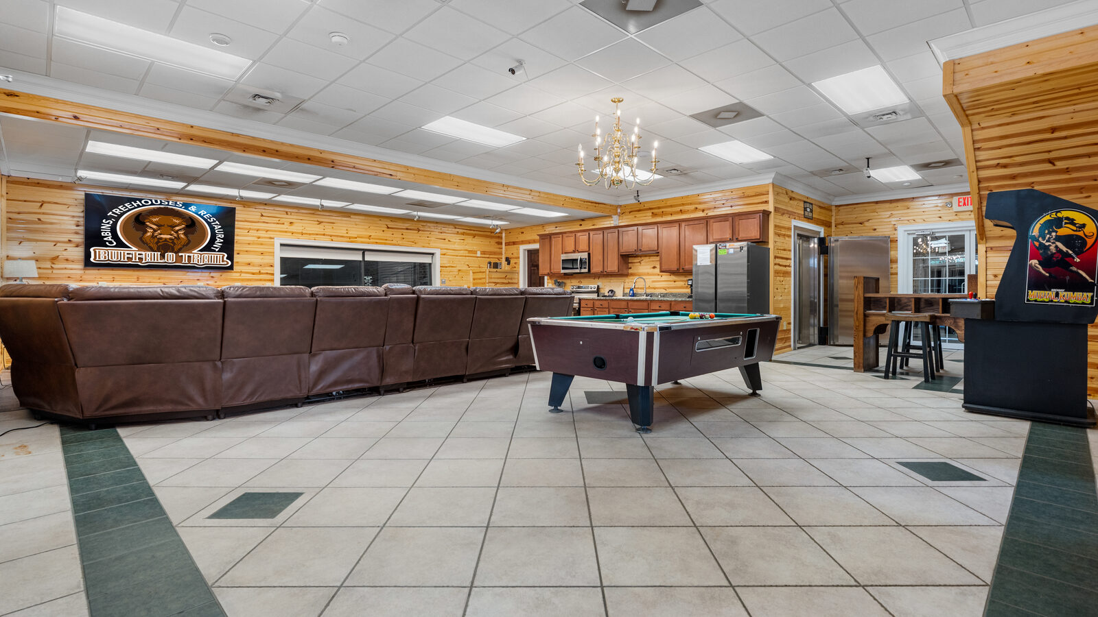 The Old Bank Lodge great room with pool table and arcade